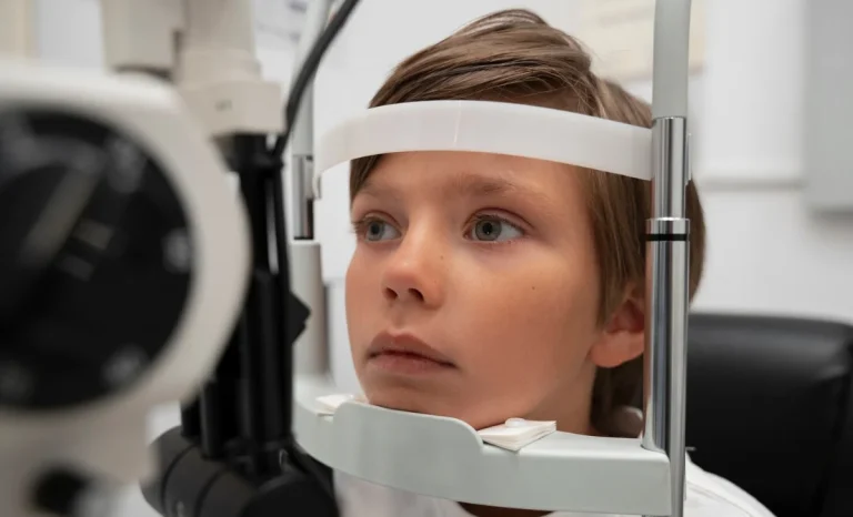 a boy getting eye checkup