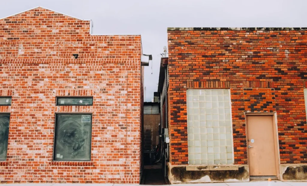 two old-looking buildings