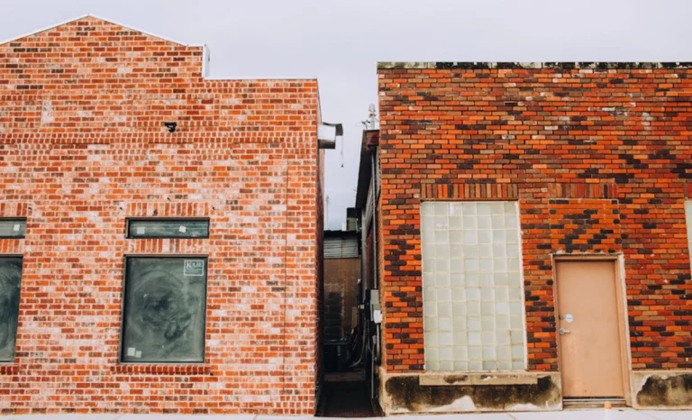 two old-looking buildings