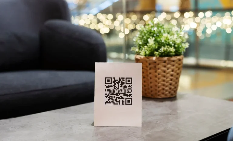 QR Code on a cardboard that's on table