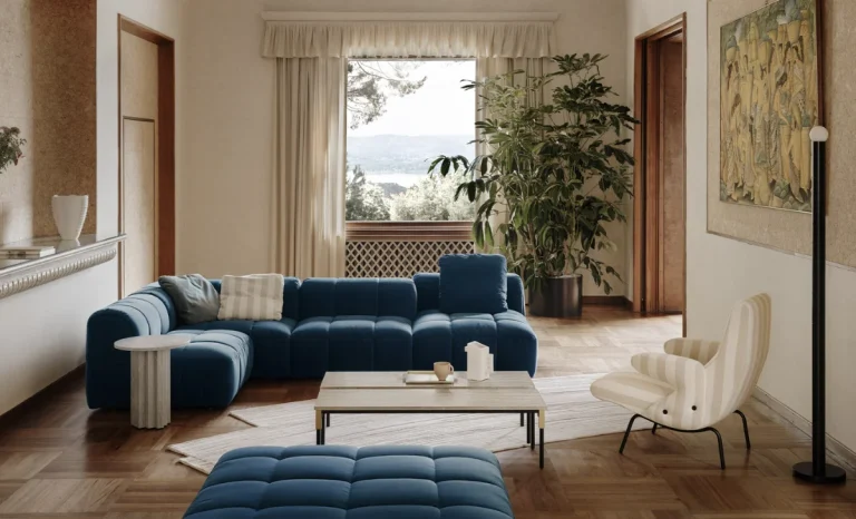 a cozy room with turned sofa