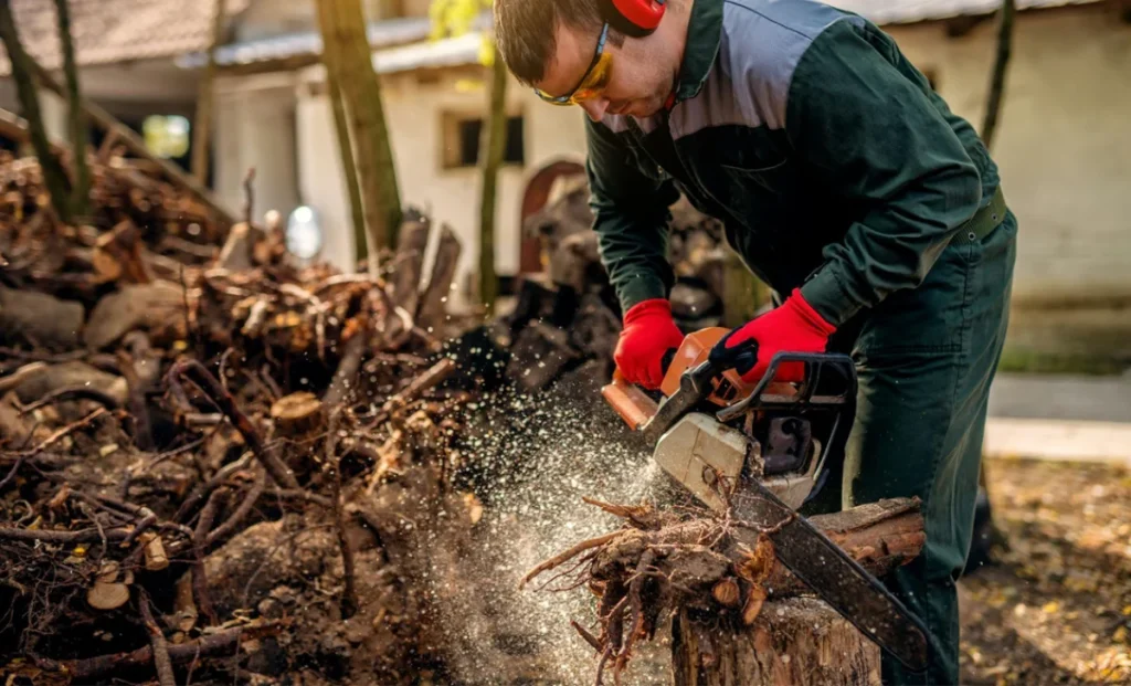 a man cutting wood with machine