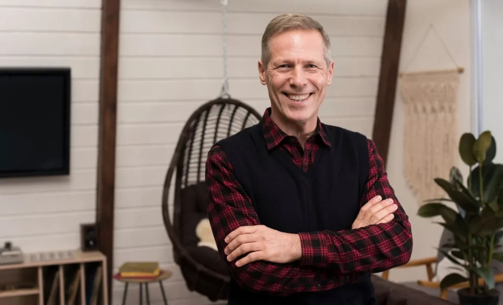 a smiling confident man