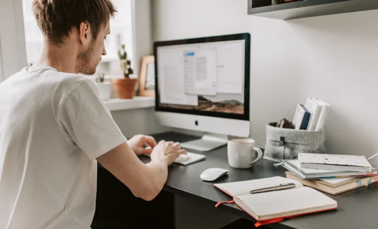 a business man using comupter in office