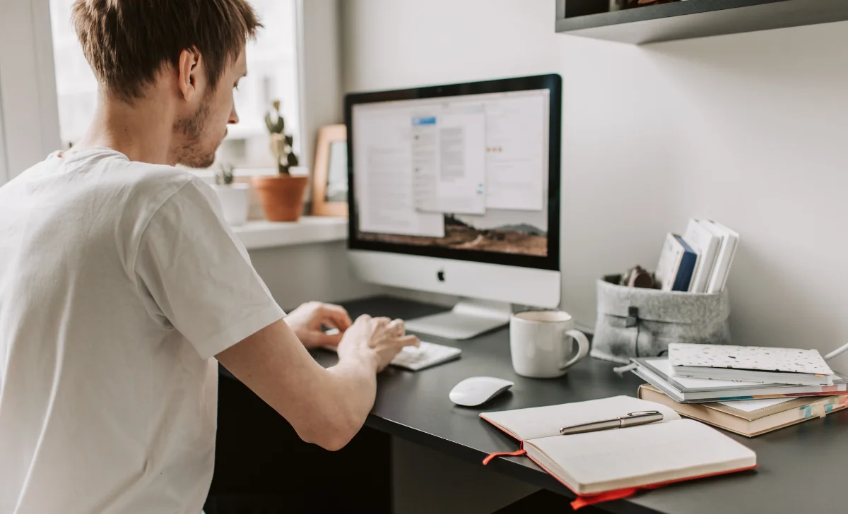 a business man using comupter in office