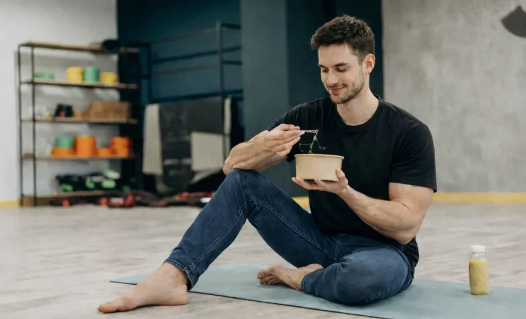 a man having a meal at gym