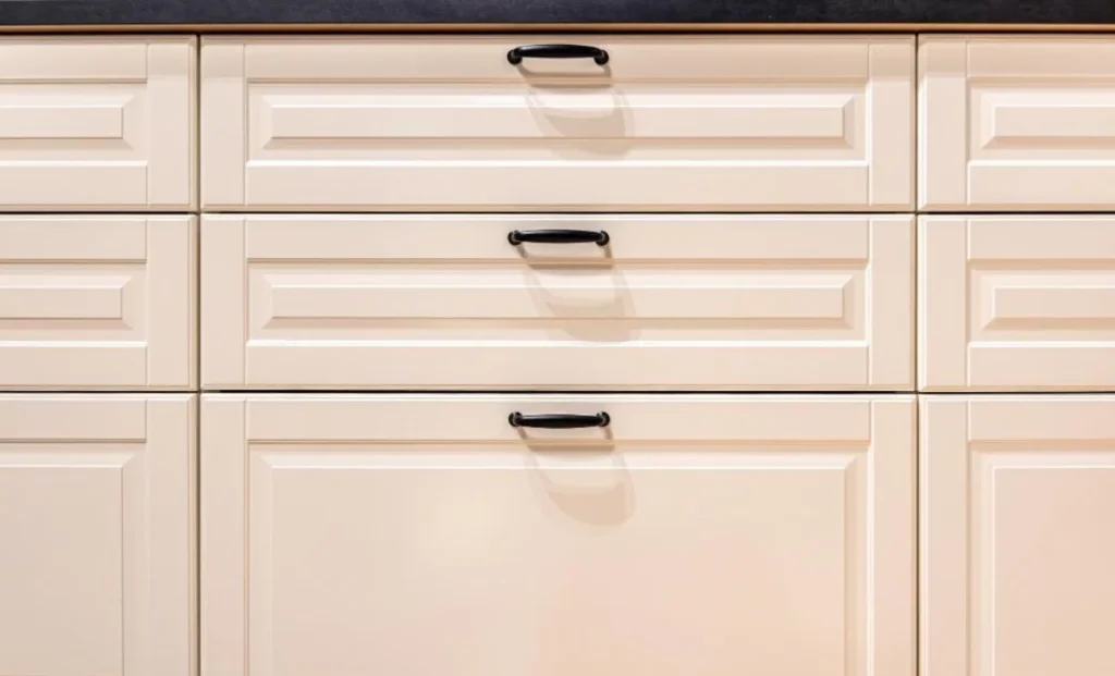 kitchen drawers with black handles