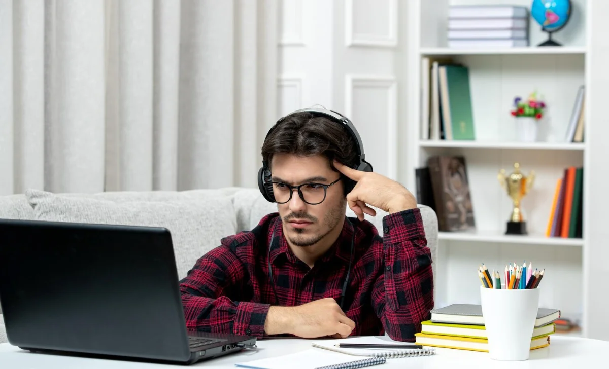 young man taking online class