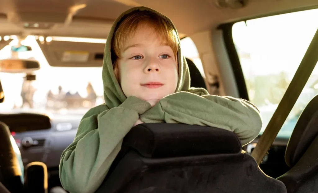 a kid in car