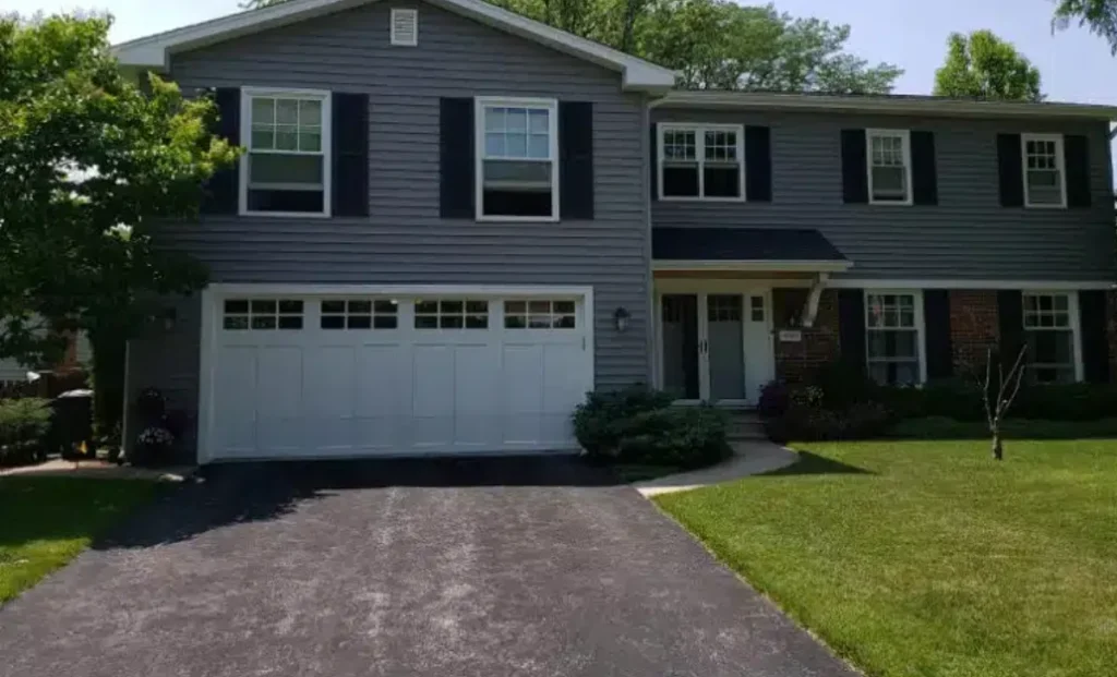 a house with white garage door
