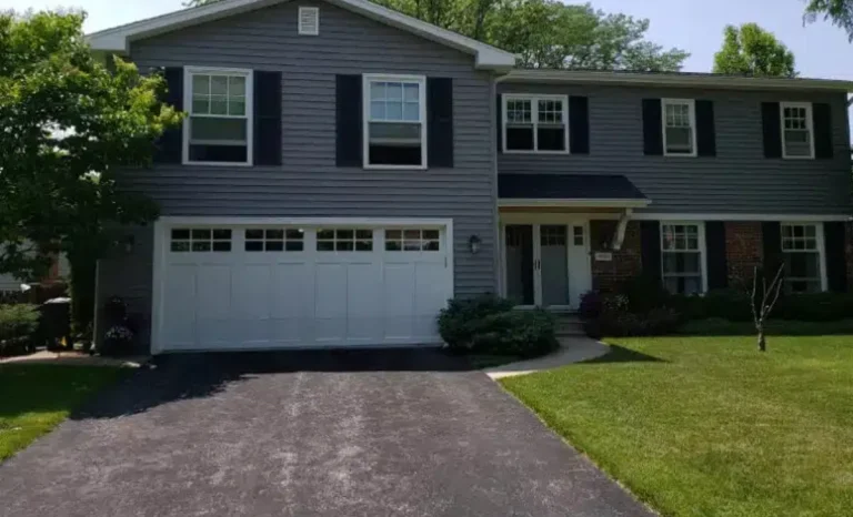 a house with white garage door
