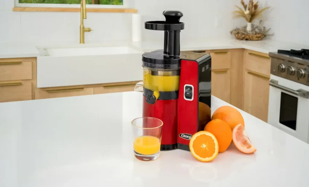 a red juicer machine