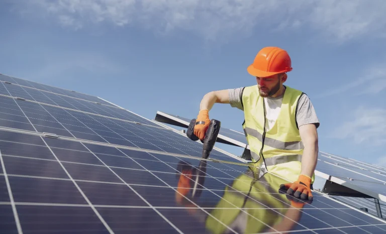a man installing solar panels