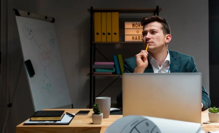 a productive man working on laptop