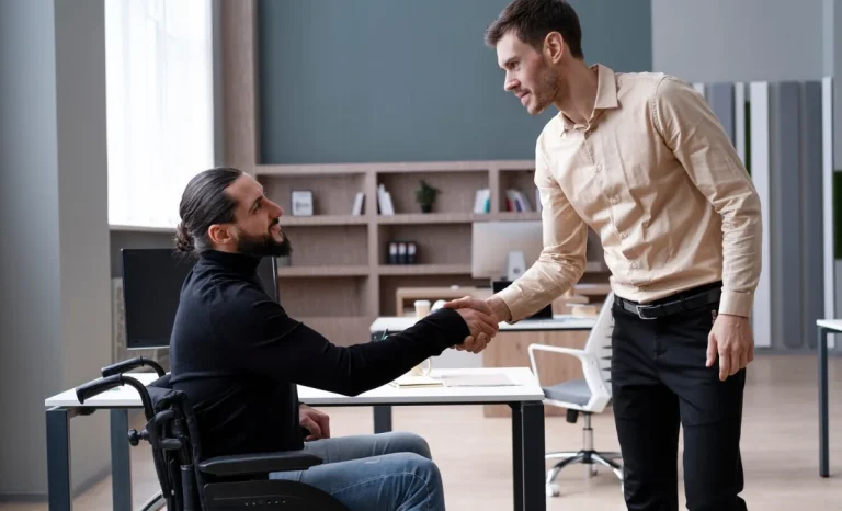 a disabled man with his supervisor