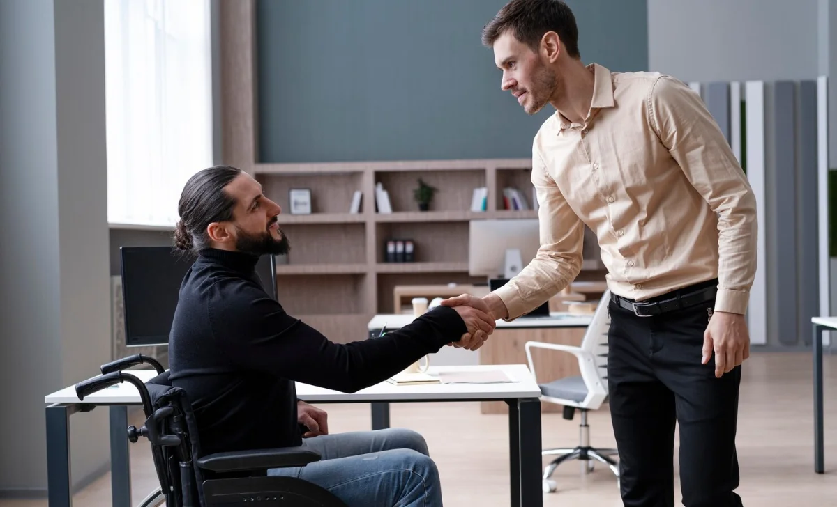 a disabled man with his supervisor
