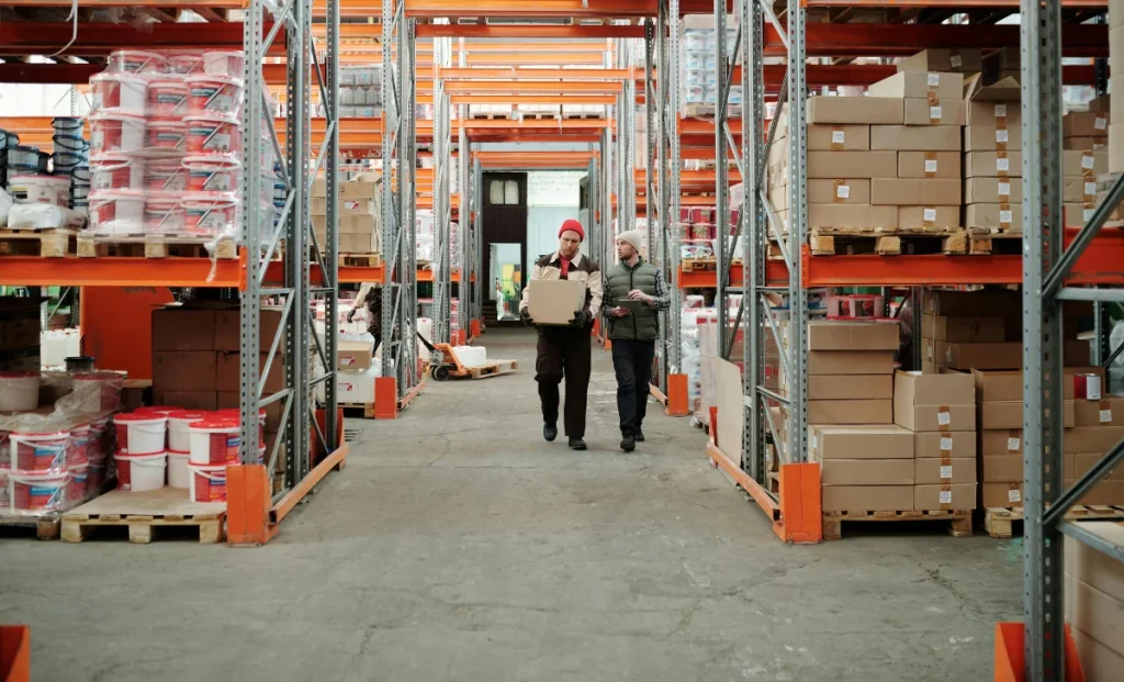 a man using tablet in warehouse