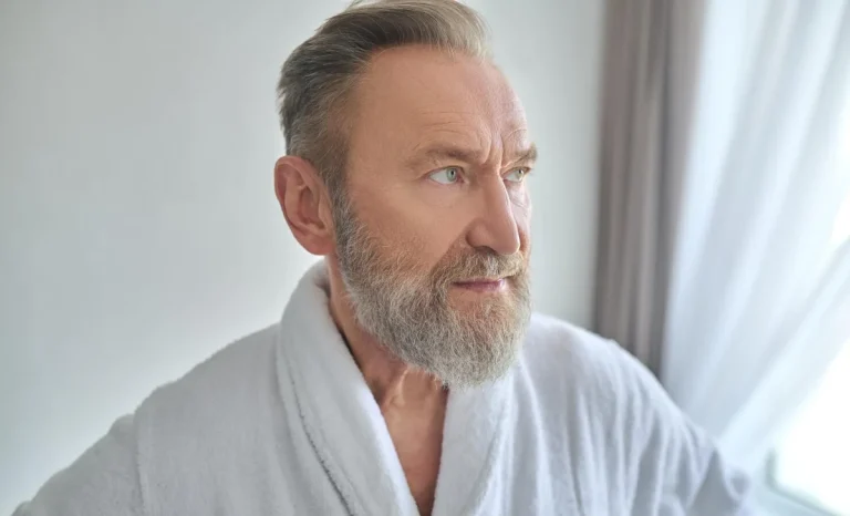 an old man with no wrinkles on his face
