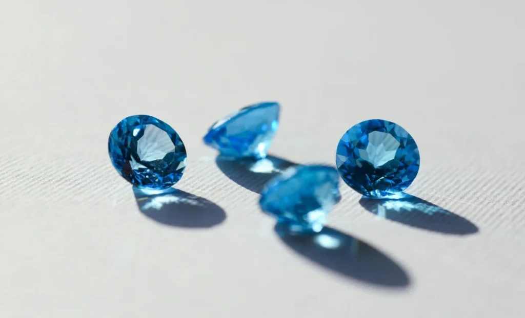 four blue gemstones