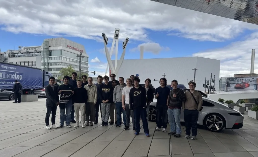 Purdue University study abroad students in 2026 outside of the Porsche Museum