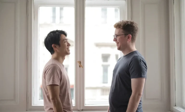 american-man-talking-to-a-japanese-man