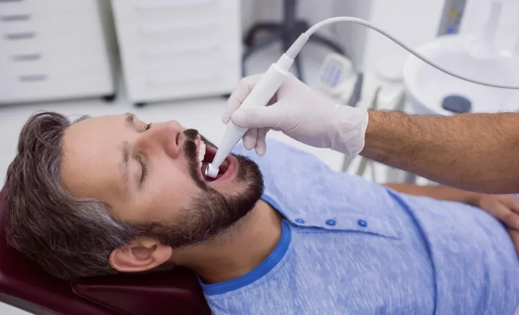 man undergoing dental check up