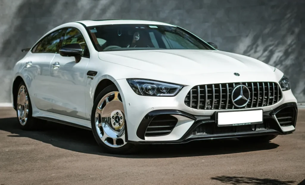 white-mercedes-benz-on-road