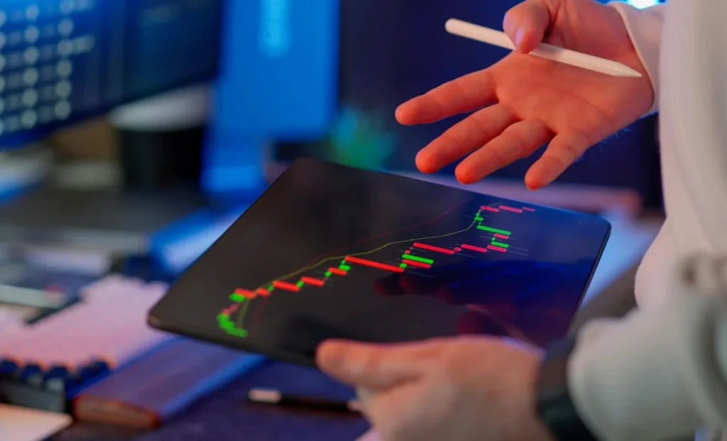 a man viewing crypto trading chart
