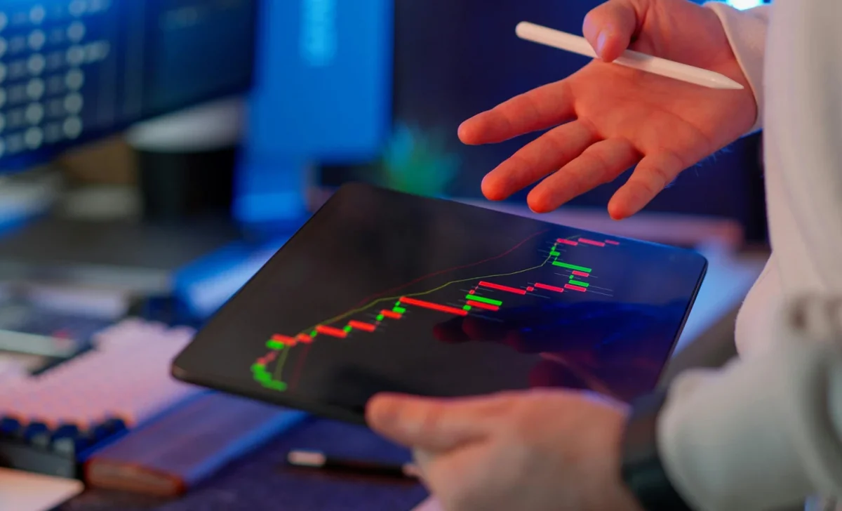 a man viewing crypto trading chart
